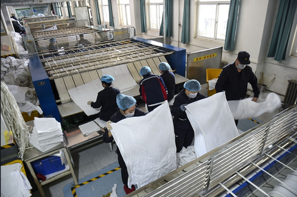 洗滌廠如何使用變頻模塊熱水爐?